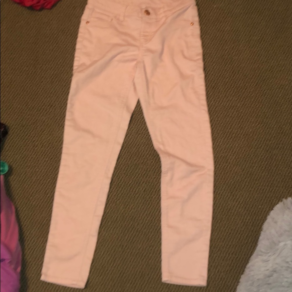 Light pink mid rise jeans